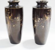 A pair of Japanese bronze vases of tapering form, Meiji period, inlaid with mixed metals,