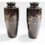 A pair of Japanese bronze vases of tapering form, Meiji period, inlaid with mixed metals,