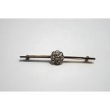 A diamond flowerhead bar brooch, the nine old brilliant cuts totalling approximately 0.76 carats, 5.