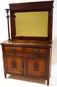 An Edwardian mahogany sideboard with raised mirrored back,