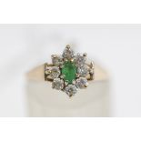 A 9 carat gold emerald and cubic zirconia cluster ring, finger size N1/2, 1.