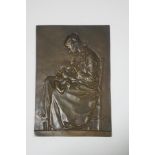 A late 19th century French bronze plaque, "Maternite",of a lady breastfeeding her baby, stamped A.L.