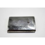 A silver slab vesta case of advertising interest, Birmingham 1925, of rectangular form,