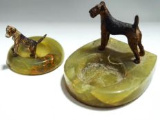 Two onyx ashtrays,