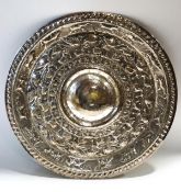 An Indian silver plated circular dish, embossed with animals and birds, 30.