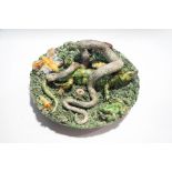 A Palissy style lizard and insect dish, by Caldas Rainha Portuguese pottery,