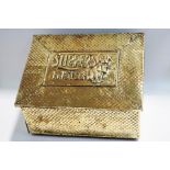 A brass slipper box with embossed pattern all over,