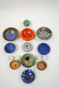 A collection of Studio Pottery wares, including a St Ives Raku vase, a French crystalline vase,