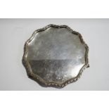 A silver salver, by Alexander Clark & Co Ltd, Sheffield 1926, with a cord moulded shaped rim,