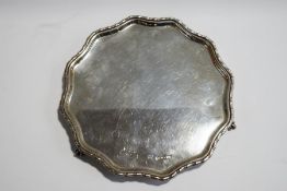 A silver salver, by Alexander Clark & Co Ltd, Sheffield 1926, with a cord moulded shaped rim,