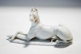 A 20th century Rosenthal porcelain model of a recumbent large dog,