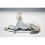 A 20th century Rosenthal porcelain model of a recumbent large dog,