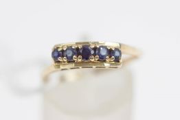 A 9 carat gold five stone sapphire ring, finger size S,1.