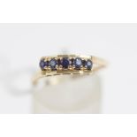 A 9 carat gold five stone sapphire ring, finger size S,1.