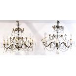 A pair of cut glass and moulded six branch chandeliers,