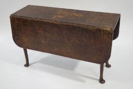 A late 17th/early 18th Century oak drop-leaf table, on pad feet,