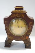 An early 20th century mantel clock with painted and gilt chinoiserie decoration,
