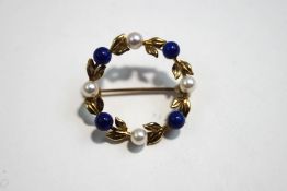 A 9 carat gold lapis lazuli and cultured pearl circlet brooch, 2.5 cm diameter, 3.