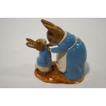 A large Royal Doulton Beswick Ware figure of Mrs Rabbit and Peter, no.