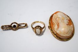 A 9 carat gold shell cameo ring, finger size K1/2,