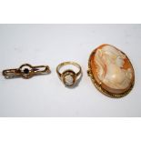 A 9 carat gold shell cameo ring, finger size K1/2,