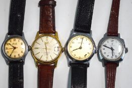 A collection of four gentleman's wrist watches,