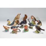 A collection of figures of birds, four Royal Worcester,