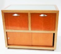 A mid 20th century layered plywood two drawer filing cabinet,