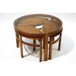 A 1960's Nathan teak coffee table with three fitted smaller tables,