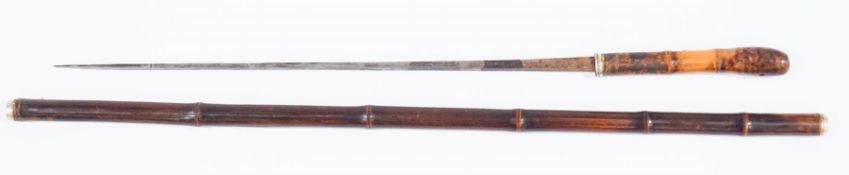 A 19th century German swordstick, the 43cm long blade stamped Solingen,