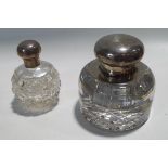 A silver mounted glass inkwell;