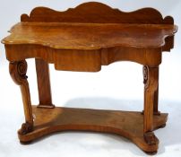 A Victorian mahogany hall table with shaped back, one frieze drawer,