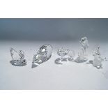 Five Swarovski Crystal ornaments: Wolf, Polar Bear, Seahorse, Bee with flower, Swan (missing stand),