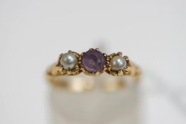 A 9 carat gold amethyst and cultured pearl three stone ring, finger size N, 2.