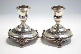 A pair of Israeli desk candlesticks, stamped 'Ben Zion', 'Israel' and 'Sterling', 7 cm high,