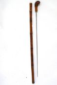 An early 20th Century swordstick with a bamboo surround and a Solingen blade