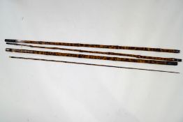 A four piece 'flamed bamboo' early roach pole