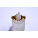 An 18ct gold opal ring, with partial hallmark, finger size N1/2, 2.