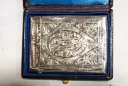 A Victorian silver card case, with vacant cartouche, in case, Birmingham 1886,