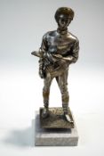 A pewter figure of a Jockey, designed by R.