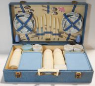 A vintage Brexton picnic hamper with china and melamine contents