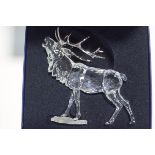 A Swarovski Crystal figure of a Stag, 14cm high,