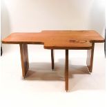 A mid 20th century layered plywood desk