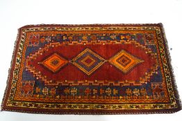 A mid 20th century Lori rug,