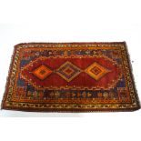 A mid 20th century Lori rug,