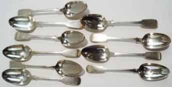 A set of six Victorian silver fiddle pattern table spoons, by George Adams, London 1855,