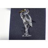 A Swarovski Crystal figure of a heron, 15cm high,