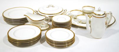 A Royal Worcester Viceroy pattern dinner service, white with gilt banding,