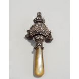 A silver and mother of pearl teether, whistle rattle, Birmingham 1923, in the antique style, 8.