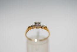 A diamond single stone ring, stamped '14K', the old brilliant cut of approximately 0.
